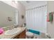 Bathroom with a sink, vanity, toilet, and shower/tub combo at 5094 Se 89Th St, Ocala, FL 34480