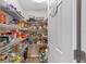 Walk-in pantry with wire shelving offering ample storage for food and supplies at 5094 Se 89Th St, Ocala, FL 34480