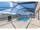 Enclosed swimming pool and surrounding deck offer a private outdoor space at 5094 Se 89Th St, Ocala, FL 34480