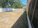 Large backyard surrounded by a new white privacy fence at 5155 Sw 39Th St, Ocala, FL 34474