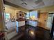 Open-concept kitchen in clubhouse, featuring white cabinetry and updated appliances, perfect for events at 5155 Sw 39Th St, Ocala, FL 34474