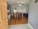 Open concept dining room with lots of natural light and wood flooring at 5155 Sw 39Th St, Ocala, FL 34474