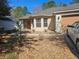 Charming home featuring a bay window, neutral stucco and a one car garage with updated landscaping at 5155 Sw 39Th St, Ocala, FL 34474