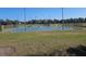 Community tennis courts with blue surface and surrounding grass at 5155 Sw 39Th St, Ocala, FL 34474
