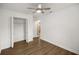 Bedroom with wood floors and a closet with bi-fold doors at 6 Cherry Drive Ln, Ocala, FL 34472