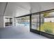 View of the pool and screen from covered patio area of the home at 6 Cherry Drive Ln, Ocala, FL 34472