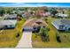 An aerial view of the property shows the mature landscaping, a two-car garage, and surrounding neighborhood at 6188 Sw 84Th St, Ocala, FL 34476