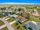 An aerial shot captures the home's setting within a peaceful residential neighborhood with well maintained yards at 6188 Sw 84Th St, Ocala, FL 34476