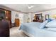 This bedroom features tiled floor and leads into the ensuite bathroom at 6188 Sw 84Th St, Ocala, FL 34476