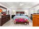 Relaxing bedroom featuring light walls, blue bedding, and patterned carpets at 6188 Sw 84Th St, Ocala, FL 34476