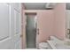 Cozy bathroom featuring a shower with glass door and marble countertop vanity at 6793 Sw 111Th Loop, Ocala, FL 34476