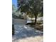 View of the patterned brick driveway leading to the two-car garage at 8045 Sw 115Th Loop, Ocala, FL 34481