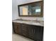 Elegant bathroom vanity with double sinks and granite countertops at 8498 Sw 129Th Terrace Rd, Dunnellon, FL 34431