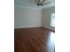 Spacious bedroom with beautiful wood floors and ample natural light at 8498 Sw 129Th Terrace Rd, Dunnellon, FL 34431