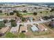 An overhead aerial shot of houses in the area close to a golf course at 9285 Sw 90Th St, Ocala, FL 34481