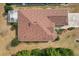 Aerial view of home showing roof, lawn, and driveway at 9285 Sw 90Th St, Ocala, FL 34481