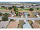 A wide street view of the house and neighboring properties in this residential neighborhood at 9285 Sw 90Th St, Ocala, FL 34481