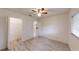 Bedroom featuring bright natural light, ample closet space, and neutral walls at 9286 Sw 89Th Court Rd # D, Ocala, FL 34481