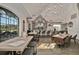 The building's stylish bar area has tile accents and pendant lighting with outdoor views at 10958 Sw 86Th Ct, Ocala, FL 34481