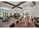 A community dining room offers tables, chairs, natural light and a tall ceiling at 10958 Sw 86Th Ct, Ocala, FL 34481