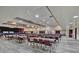 Spacious event space with hardwood floors and stage, perfect for large gatherings and celebrations at 10958 Sw 86Th Ct, Ocala, FL 34481