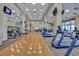A modern gym offers plenty of natural light and state-of-the-art equipment and plenty of space at 10958 Sw 86Th Ct, Ocala, FL 34481