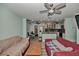 A view from the living room into the bright, open kitchen at 10958 Sw 86Th Ct, Ocala, FL 34481