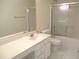 Bathroom featuring a shower/tub combo and a vanity at 11353 Sw 138Th Ln, Dunnellon, FL 34432