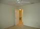 Bedroom featuring neutral carpet, fresh paint, and a ceiling fan at 11353 Sw 138Th Ln, Dunnellon, FL 34432