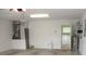 Garage featuring lots of open space and a utility sink at 11353 Sw 138Th Ln, Dunnellon, FL 34432