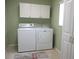 Laundry room featuring a washer and dryer at 11353 Sw 138Th Ln, Dunnellon, FL 34432