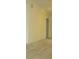 Clean room showcasing neutral paint, carpet flooring, and view of the doorway at 11353 Sw 138Th Ln, Dunnellon, FL 34432