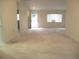 Open living space filled with natural light, featuring access to the outdoors at 11353 Sw 138Th Ln, Dunnellon, FL 34432