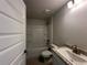 The bathroom has a granite vanity, shower and tub combination, and a tiled floor at 120 Dogwood Drive Cir, Ocala, FL 34472