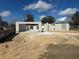 Image of a home under construction with concrete blocks and a blue sky backdrop at 120 Dogwood Drive Cir, Ocala, FL 34472