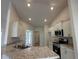 Kitchen featuring granite countertops, stainless steel appliances, recessed lights, and tile flooring at 120 Dogwood Drive Cir, Ocala, FL 34472