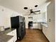 Modern kitchen featuring granite countertops, stainless steel appliances, and bright white cabinetry at 15040 Sw 29Th St, Ocala, FL 34481