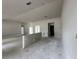 Large living room with multiple doorways at 2 Dogwood Crse, Ocala, FL 34472