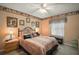 Relaxing bedroom featuring warm tones, soft textures, and ample natural light at 2538 Privada Dr, The Villages, FL 32162