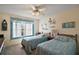 Serene bedroom with two twin beds, nautical accents, and a soothing color scheme at 2538 Privada Dr, The Villages, FL 32162