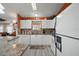 Well-lit kitchen boasts modern appliances, granite countertops and ample cabinet space for easy organization at 2538 Privada Dr, The Villages, FL 32162