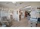 Bright interior view of a comfortable space with a view into an eat-in kitchen area at 2538 Privada Dr, The Villages, FL 32162