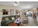 Open-concept living space showcases stylish decor and an airy ambiance perfect for modern living and entertaining at 2538 Privada Dr, The Villages, FL 32162