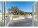 Spacious outdoor deck with wooden floors and views of nature at 2775 Sw 53Rd St, Ocala, FL 34471