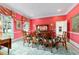 Bright dining room featuring an area rug, hardwood floors, traditional decor and large windows at 2775 Sw 53Rd St, Ocala, FL 34471