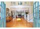 Grand foyer with high ceilings, gleaming hardwood floors, ornate mirror, and an open view to the living spaces at 2775 Sw 53Rd St, Ocala, FL 34471