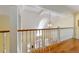 Hallway with wood floors and railing at 2775 Sw 53Rd St, Ocala, FL 34471