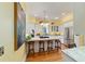 Open kitchen featuring granite countertops, stainless appliances, a gas range, and seating at the island at 2775 Sw 53Rd St, Ocala, FL 34471