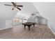 Large game room featuring a pool table, hardwood floors, and multiple ceiling fans at 32 Allenwood Look, Ormond Beach, FL 32174