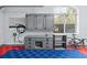This garage workstation is equipped with cabinets and an electric vehicle charger at 32 Allenwood Look, Ormond Beach, FL 32174